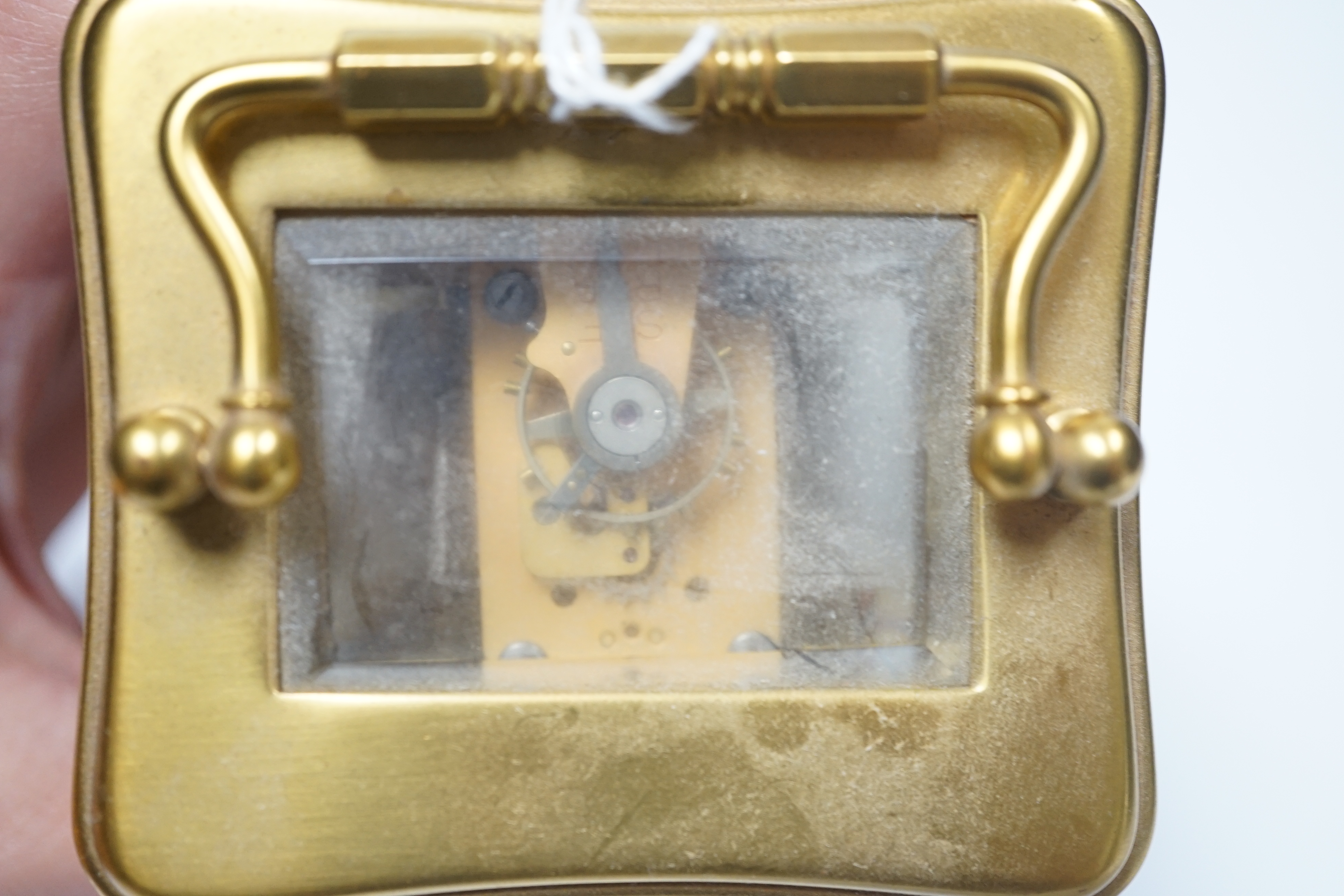 A Mappin & Webb brass carriage clock, 11cm high